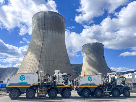 Seismic Trucks in front of nuclear plant